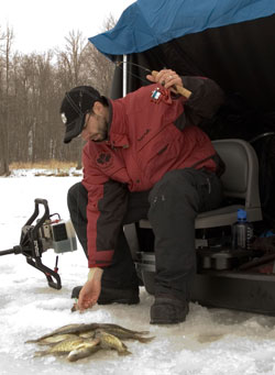 ice angler fishing for crappie