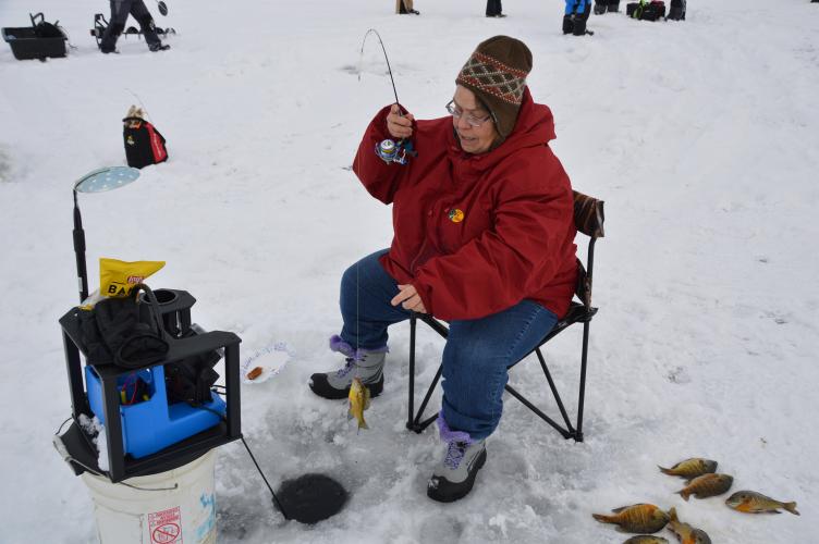 Women Angler Catching Dinner