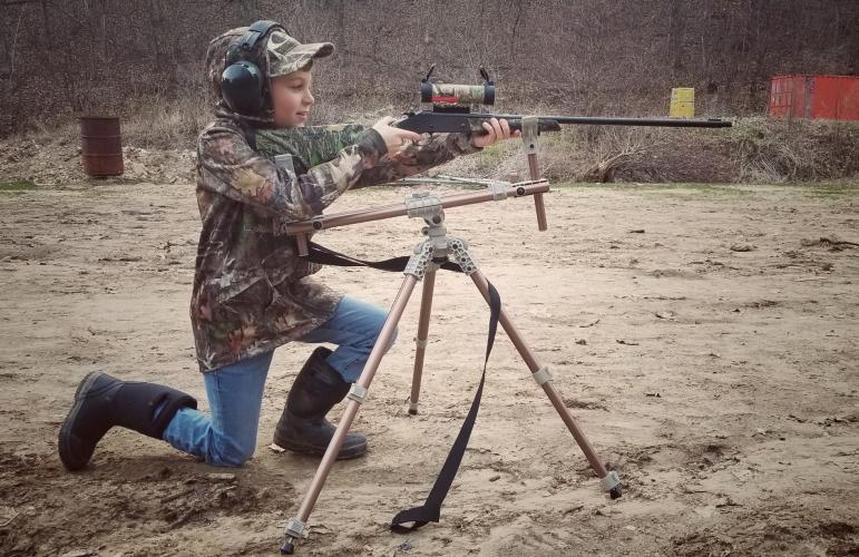 Young boy hunter getting ready to hunt turkeys