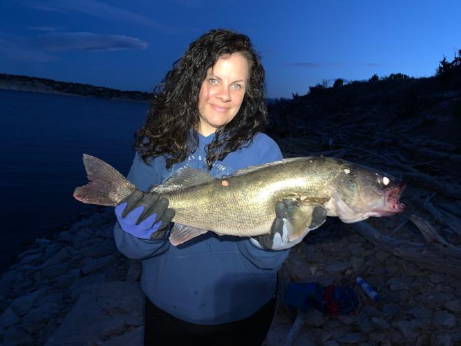 Lady angler with walleye