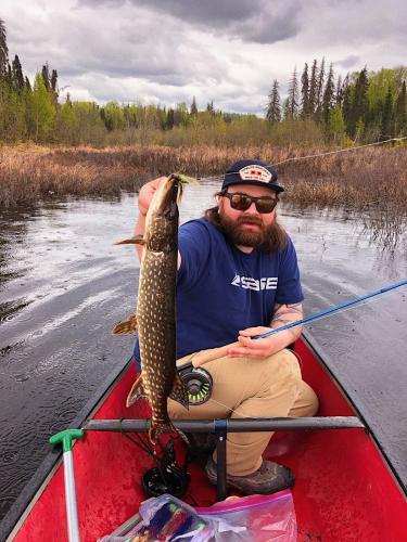 Angler with nice pike