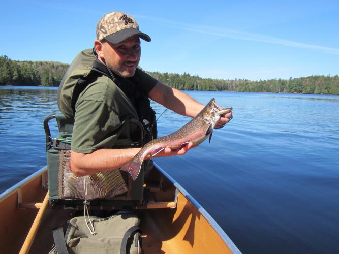 Angler holding trout