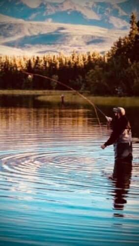 Angler fly fishing