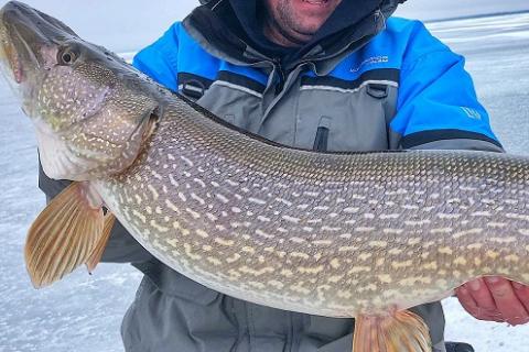 Guidesly - Monster pike catch while ice fishing. Got a 2 for 1 deal right  there. #pike #pikefishing #icefishing #fishing #northernpike #anglers