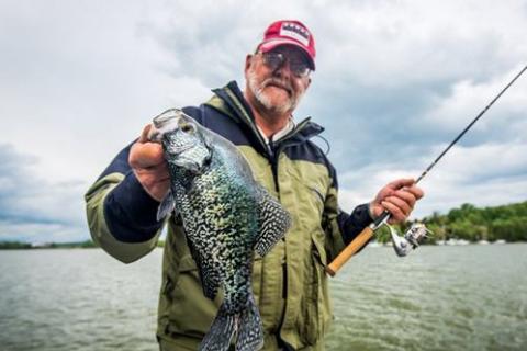 Angler holding large crappie