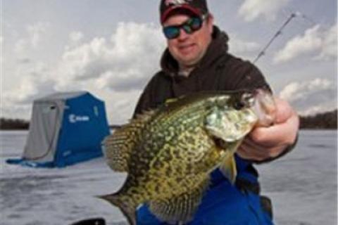 Jason Mitchell With a Nice Winter Crappie by Jason Mitchell With a Nice Winter Crappie...