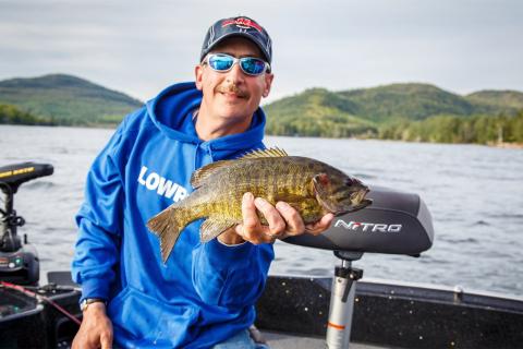 Angler with smallmouth bass