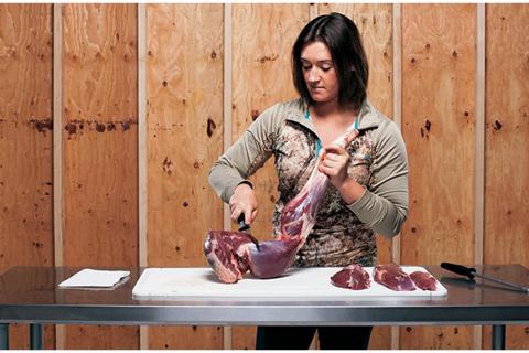 lady butchering meat