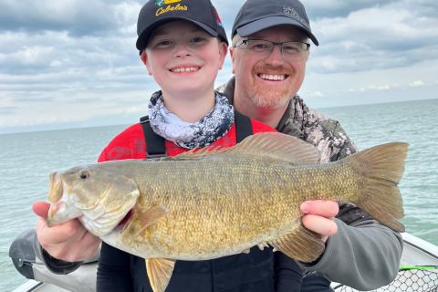 Father and Son with fish