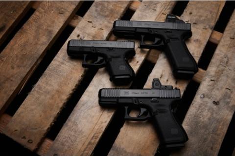 3 Glocks on pallet board