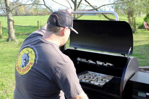 Author grilling fish for Fish Taco Boats