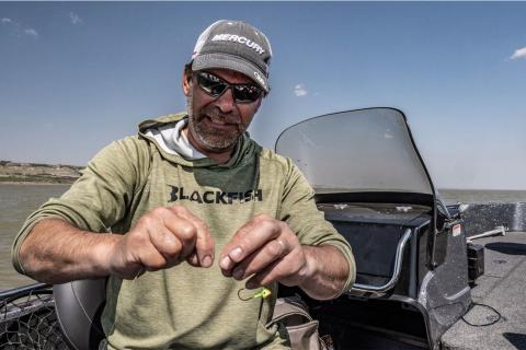 Angler Keith Kavajecz rigging a jig
