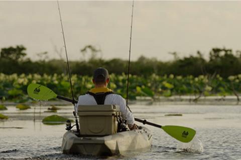 Kayak angler paddling