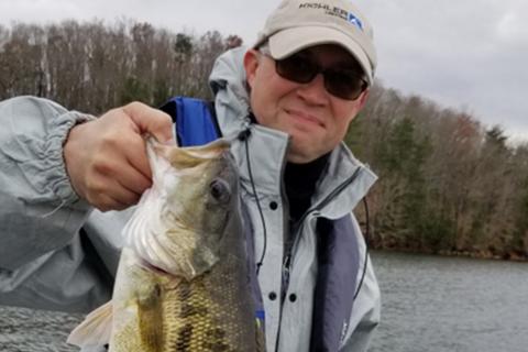 Bass angler at Lake Sidney with spotted bass