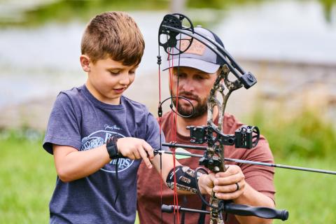 Father and son with the Faze bow