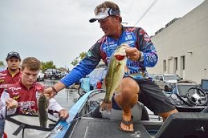 Reigning FLW Tour AOY Scott Martin bagging his catch at the 2015 Forrest Wood Cup by Reigning FLW Tour AOY Scott Martin bagging his catch at the 2015 Forrest Wood Cup...