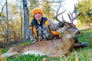 News & Tips: A Patient Hunter Tags Her Biggest Buck!...