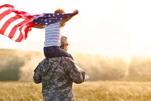 Veteran Celebrating America with Child