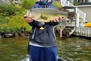 6.7 lb Largemouth bass held up by the proud angler who caught it