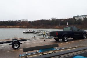 Grapevine Lake, Texas boat ramp with truck and boat trailers