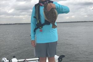 Boy with Flounder catch