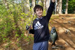 Young angler with Big Black Crappie