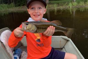 Boy holding bass