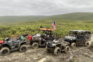 ATVs with hunting gear