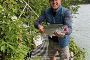 angler holding salmon