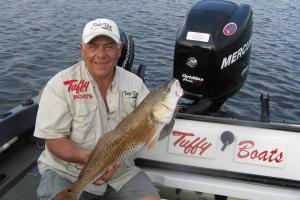 Braggin' Board Photo: Fishing Pro Tony Puccio Holding a Nice Red Fish
