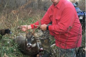 Deer hunter with big buck