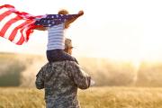 Veteran Celebrating America with Child
